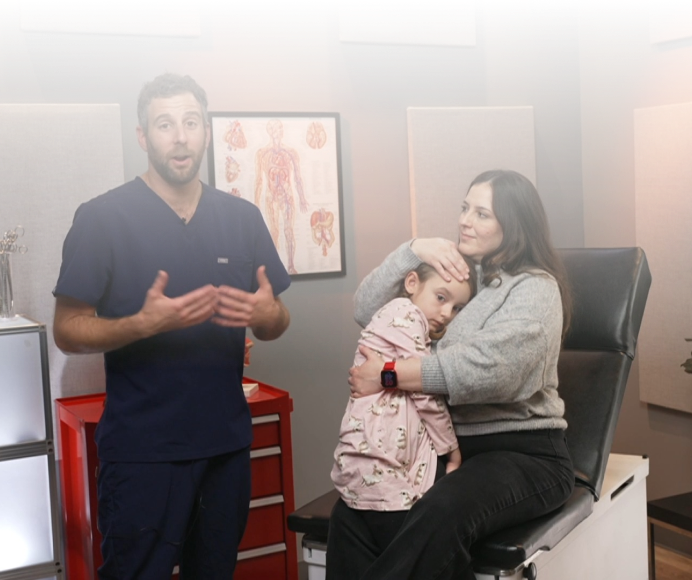 pediatric clinician with patient and guardian