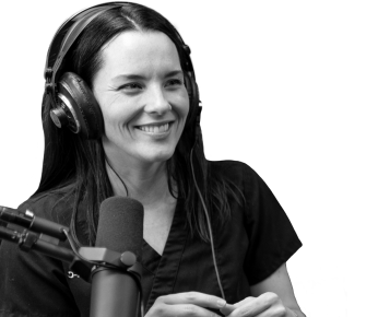 smiling woman wearing headphones with a microphone