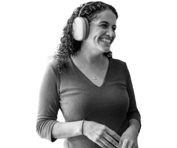 woman wearing headphones and smiling